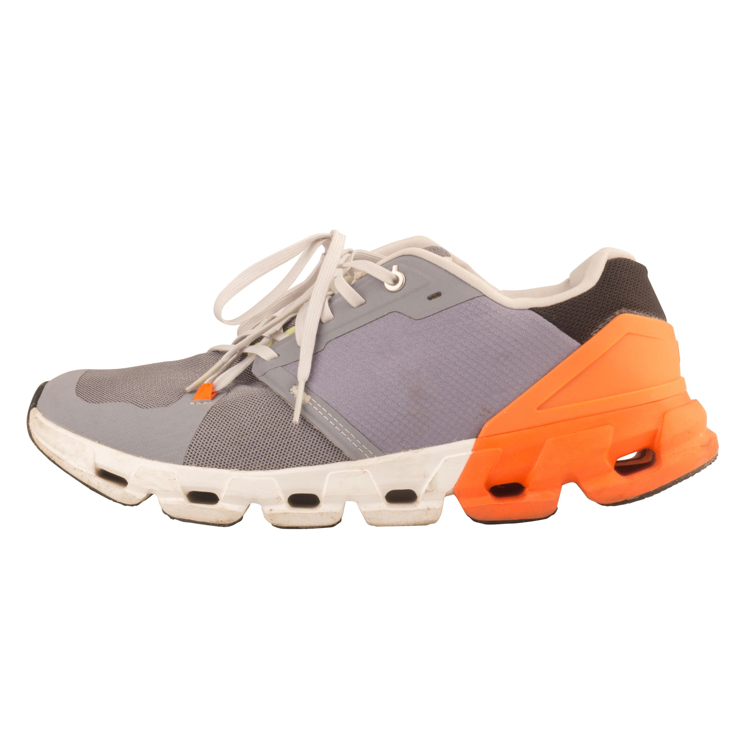 Orange sports shoes on a white background